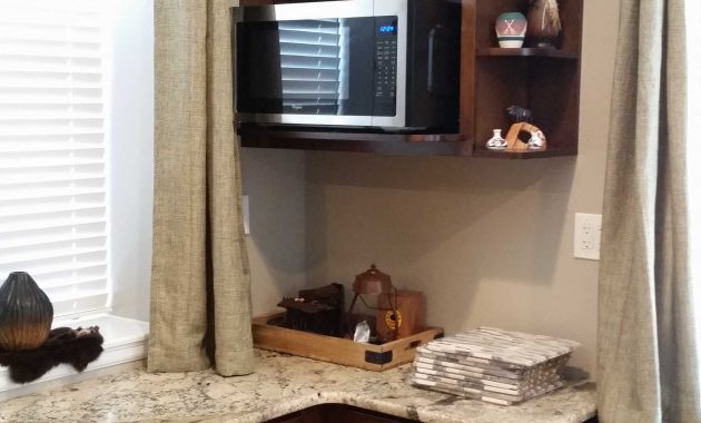 A Microwave Wall Cabinet Paired With A Shelf End Wall Cabinet In inside sizing 2250 X 4000