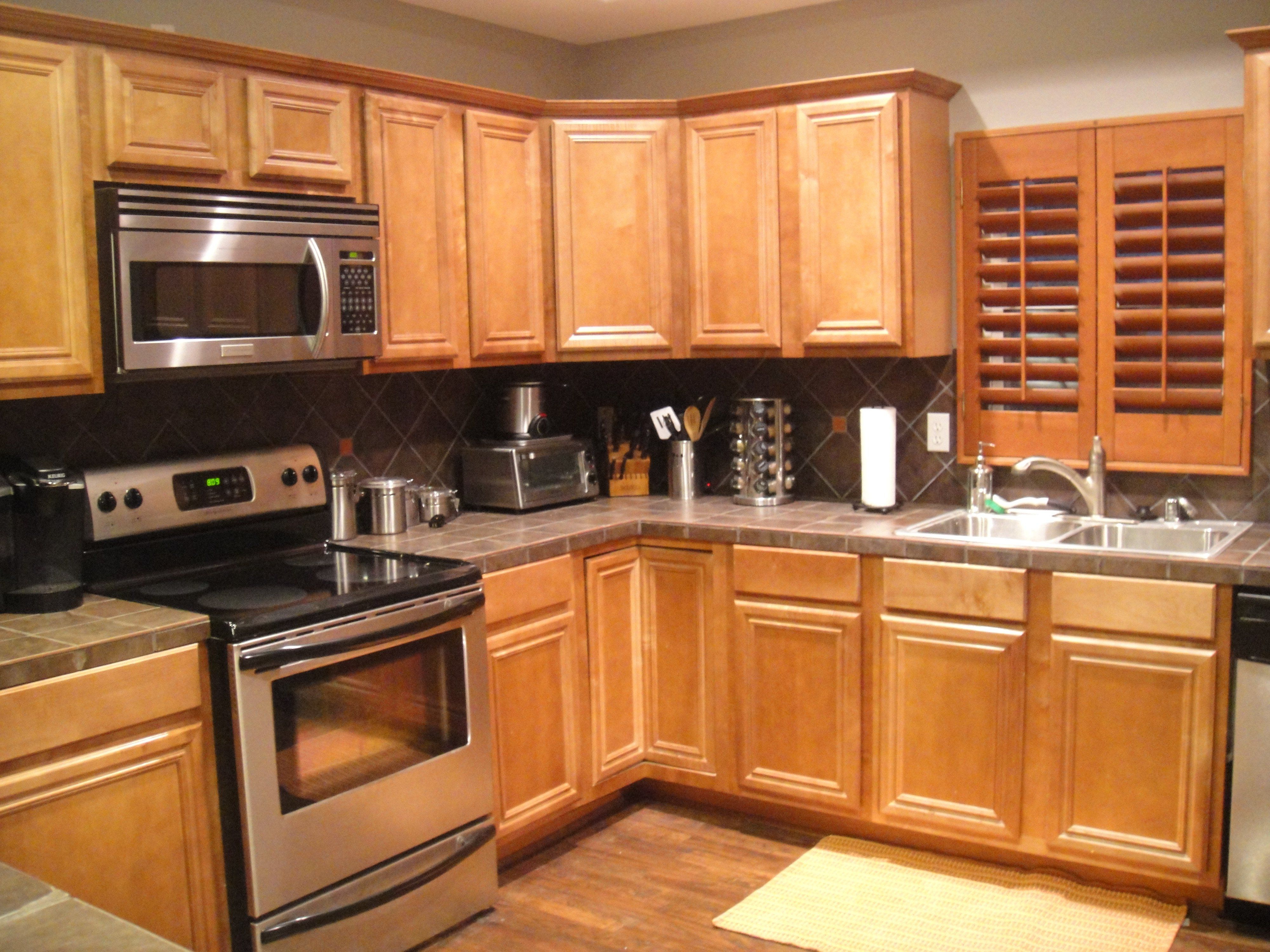 Kitchen Grey Wall Paint And Brown Wooden Oak Cabinet On Laminate throughout size 4000 X 3000