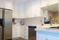 Small White Kitchen Made Bigger A Mirror Cabinetry Homecrest within measurements 3888 X 5184