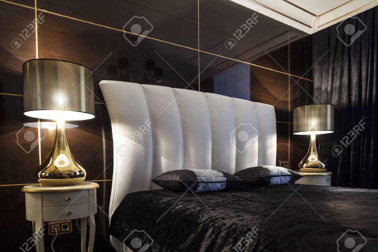 Luxury Modern Bedroom Bed In Dark Colors Stock Photo Picture And for size 1300 X 866