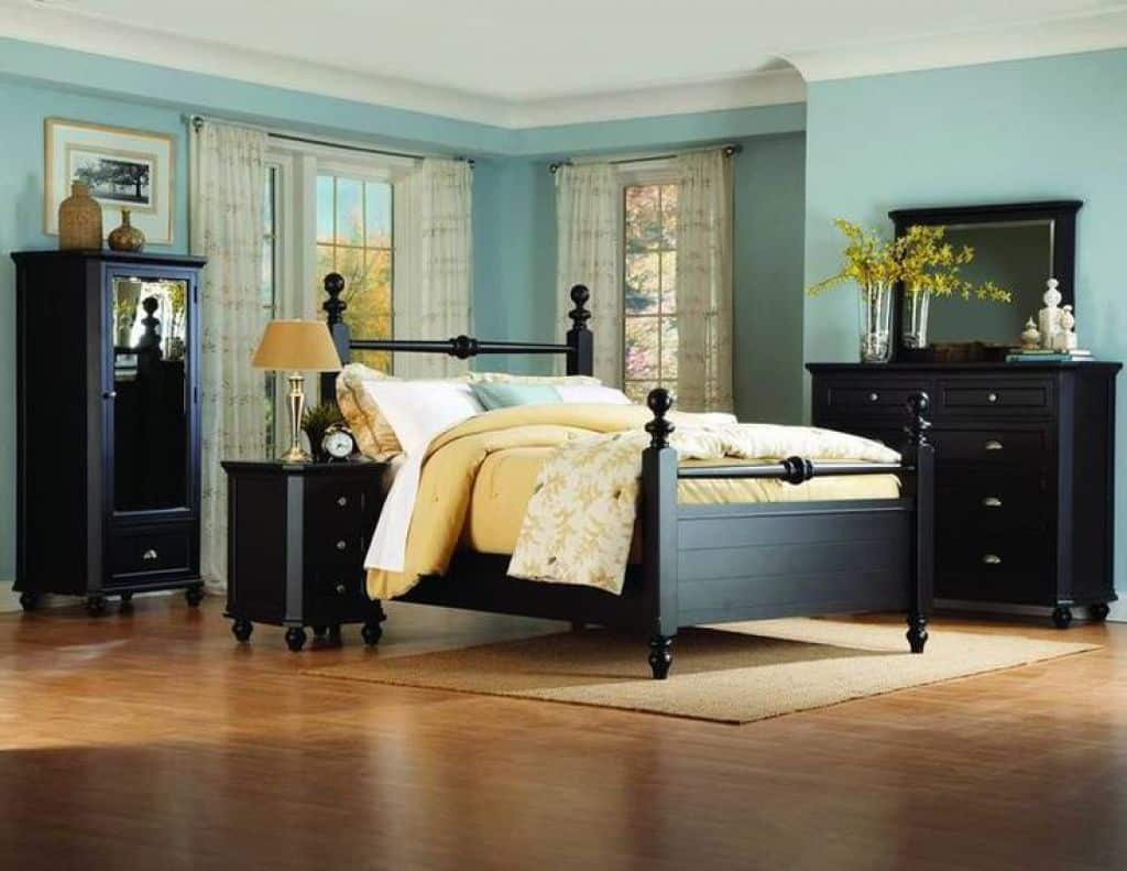 Rustic Bedroom With Brown Wall Colors And Black Bedroom Furniture regarding dimensions 1024 X 791