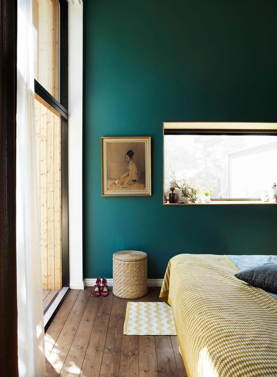 Teal Colored Walls With Generous Windows And Brown Curtains with dimensions 900 X 1224