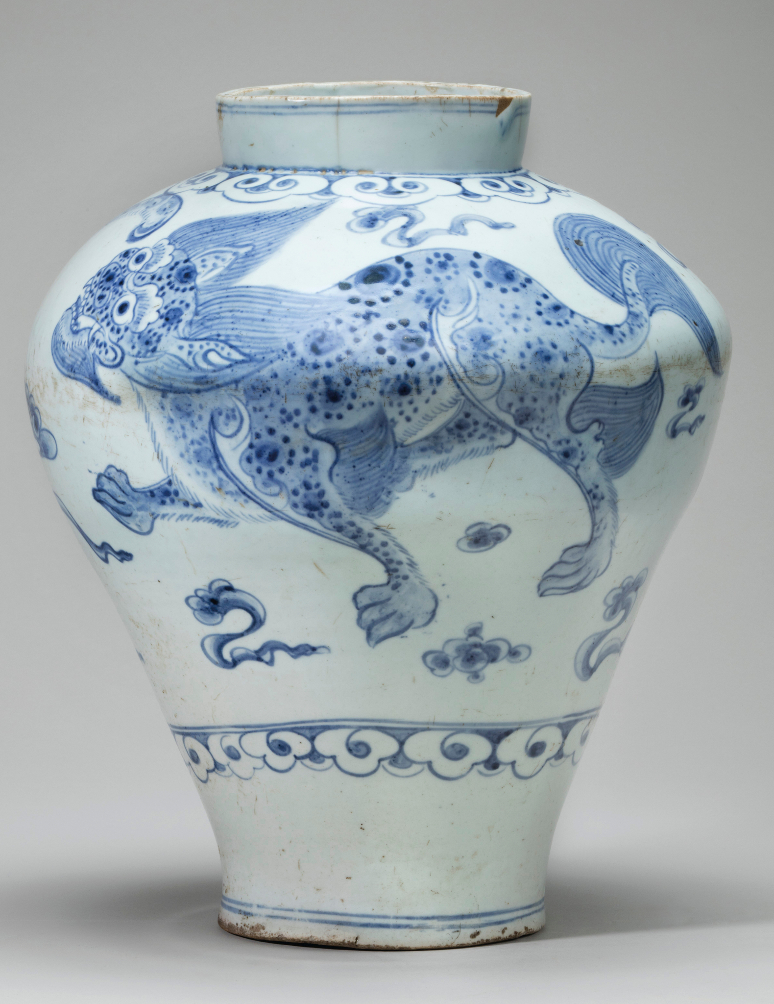 A Blue And White Porcelain Jar With A Tiger And Mythical Lion in proportions 1580 X 2048