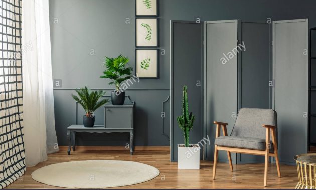 A Chair Standing In Front Of A Decorative Grey Screen Next regarding measurements 1300 X 956