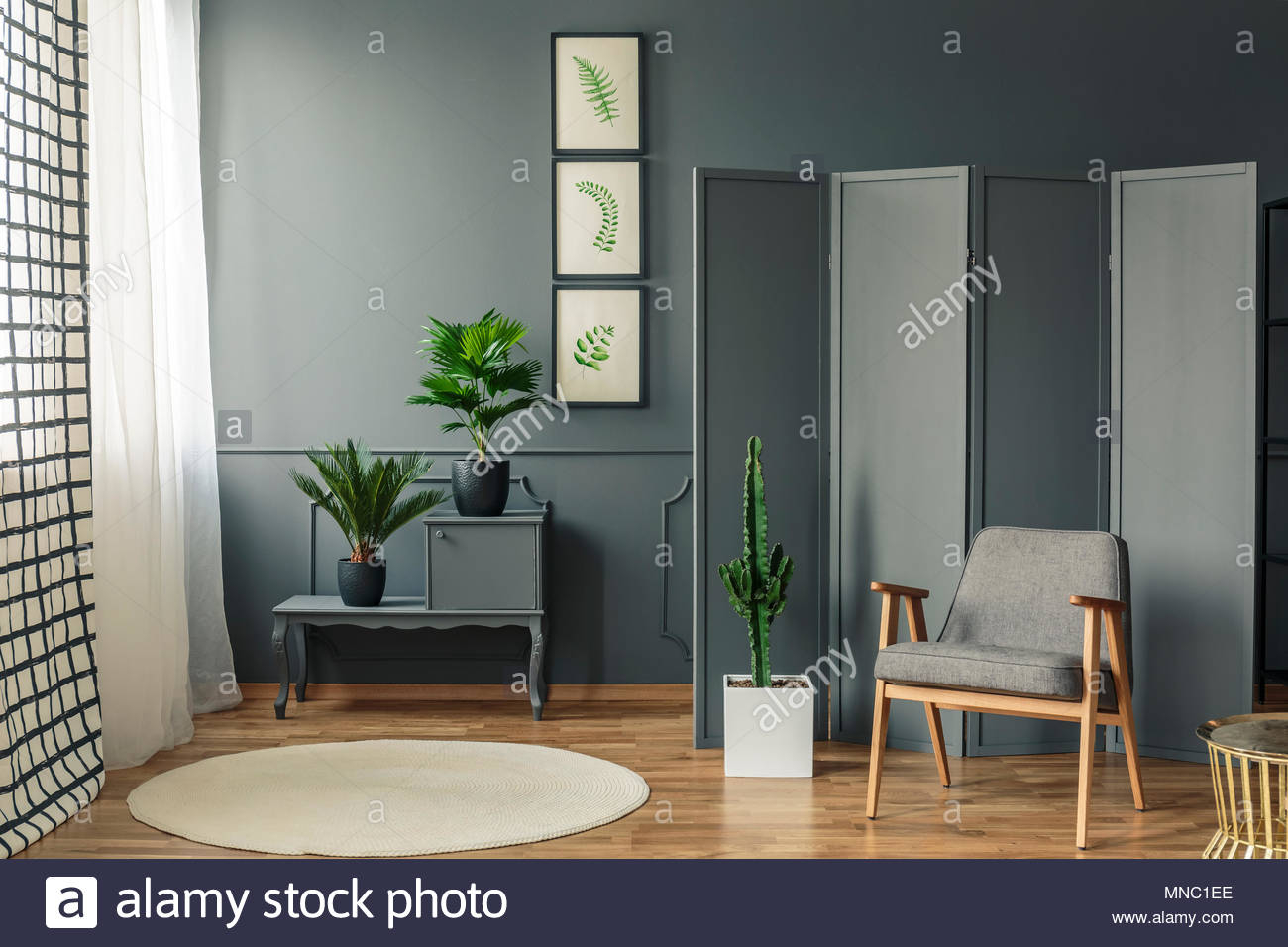 A Chair Standing In Front Of A Decorative Grey Screen Next regarding measurements 1300 X 956