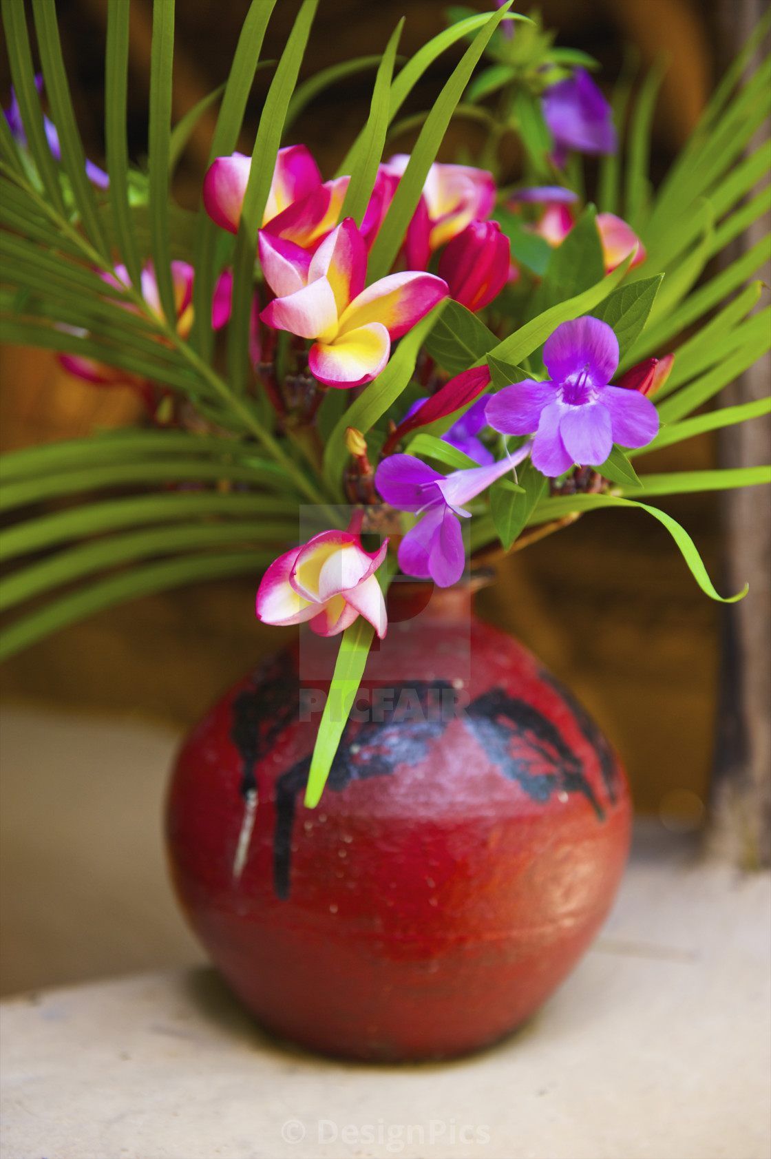 A Flower Arrangement In A Small Red Vase Ulpotha Embogama pertaining to sizing 1120 X 1683