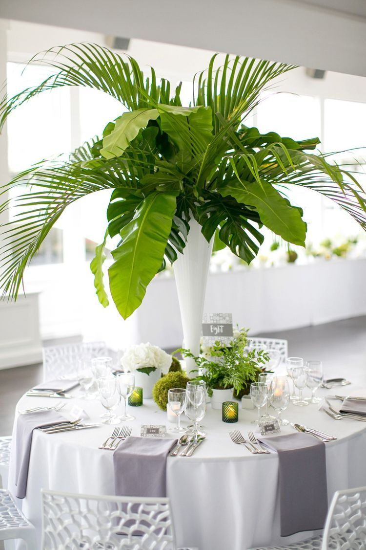 A Tall Cylinder Vase Spilling With Large Green Monstera with sizing 750 X 1125