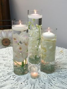 A Trio Of Cylinder Vases Using White Dendrobium Orchids inside proportions 852 X 1136