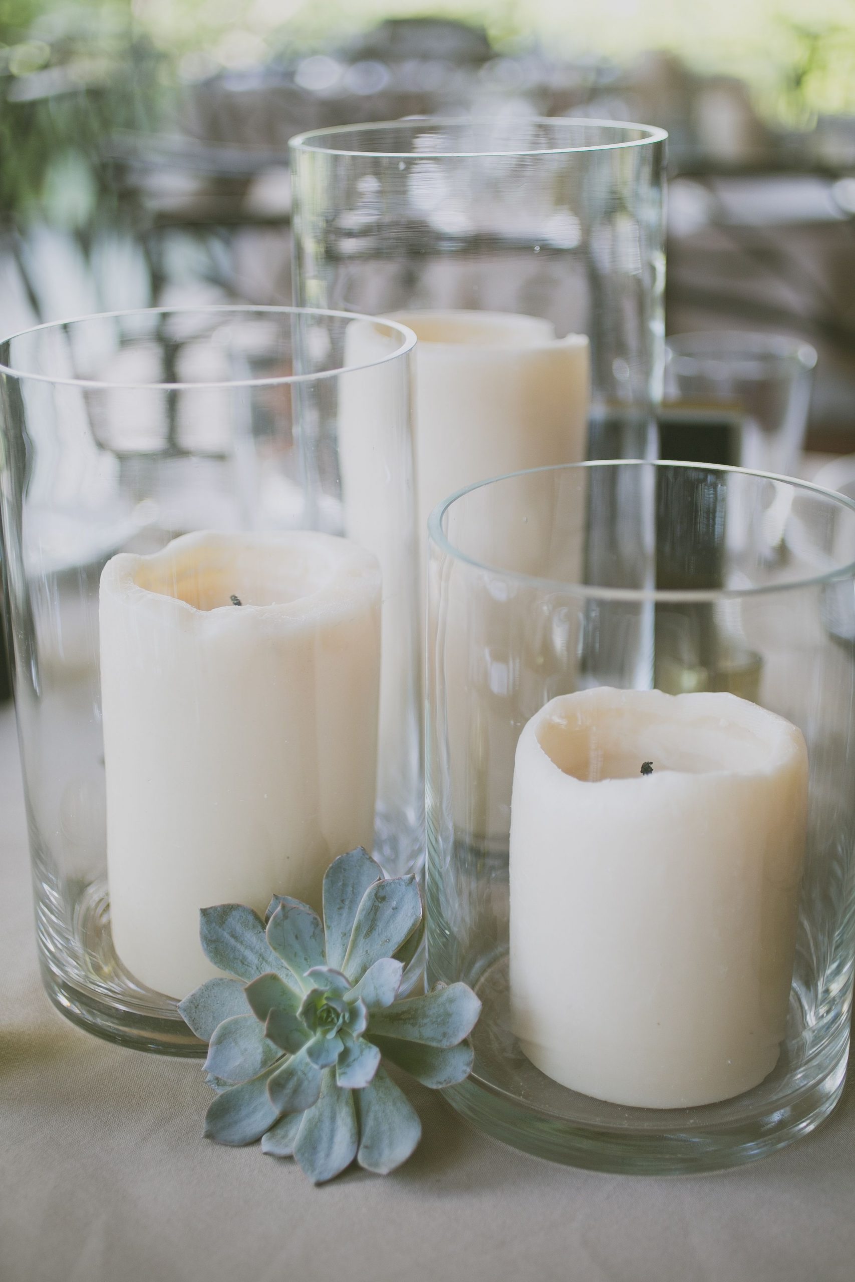 A Trio Of Led Pillar Candles In Vases With Pale Green pertaining to dimensions 2640 X 3960