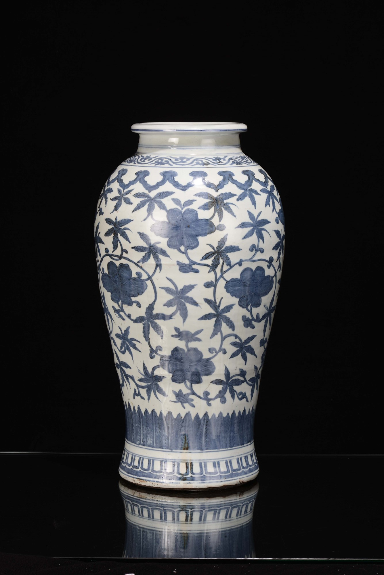 A White And Blue Porcelain Vase With Floral Decoration in sizing 1335 X 2000