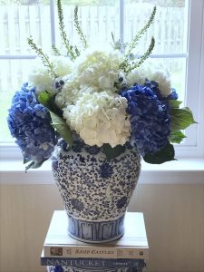 Beautiful Blue White Floral Arrangement In A Ginger Jar in size 3024 X 4032