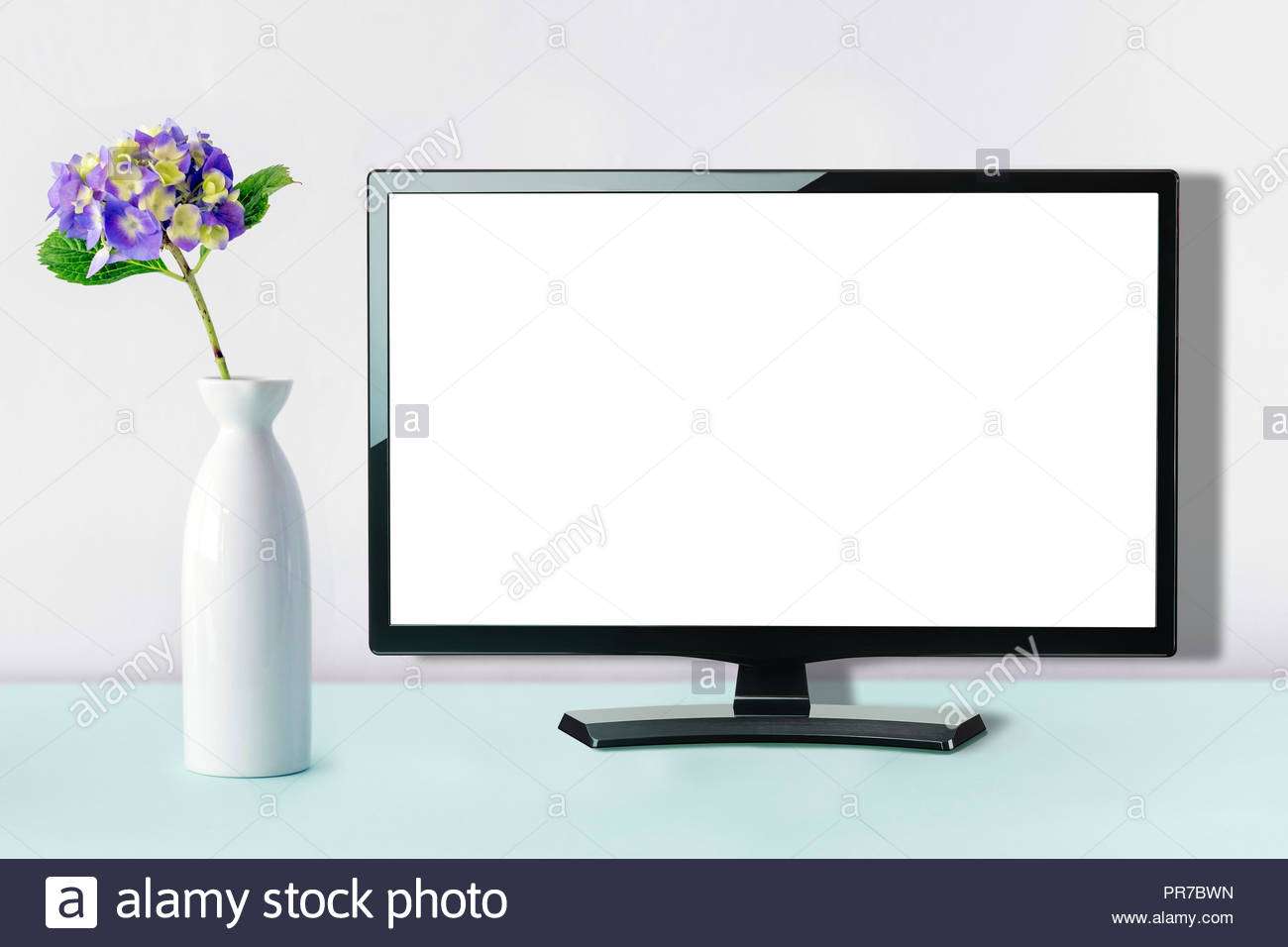 Blank Screen Flat Tv Standing Next To Vase With Flowers throughout dimensions 1300 X 956