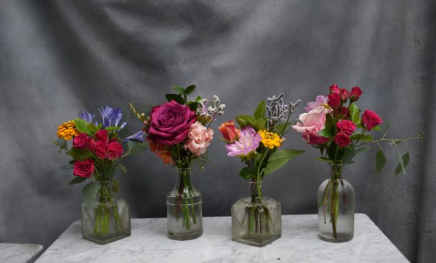 Colorful Mini Bud Vase Arrangement In Small Clear Bottles pertaining to measurements 4948 X 3382