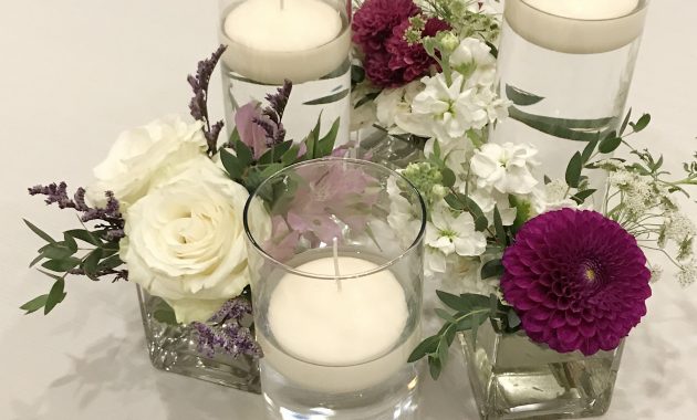 Cylinder Vases Floating Candles And Assorted Flowers For A with regard to measurements 2431 X 2431