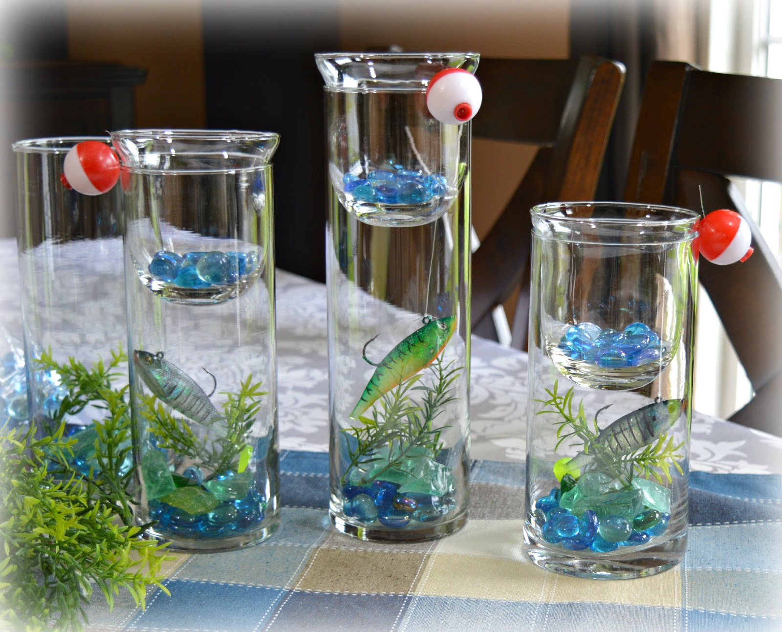 Dining Delight Fishing Centerpiece In Cylinder Vase in dimensions 1600 X 1293