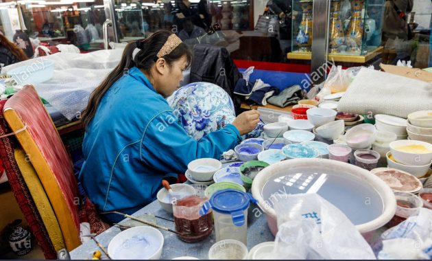 Female Factory Worker In Chinashanghaiceramic Factory with regard to sizing 1300 X 956