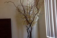 Silk Ivory Orchids With Large Branches In A Tall Rectangular for size 2448 X 3264