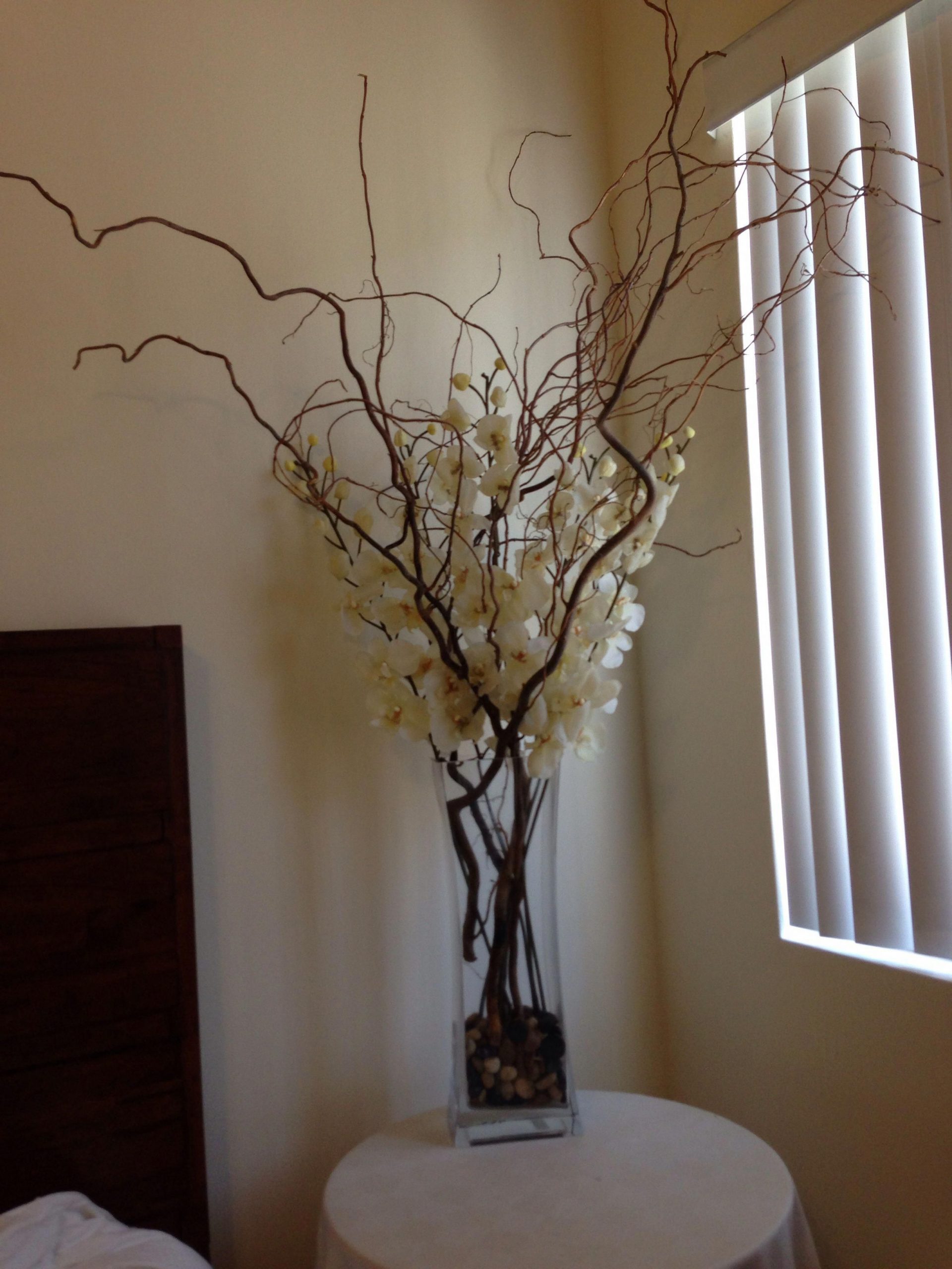 Silk Ivory Orchids With Large Branches In A Tall Rectangular for size 2448 X 3264
