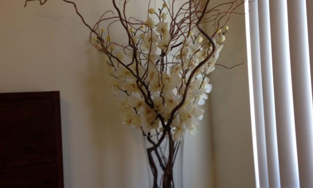 Silk Ivory Orchids With Large Branches In A Tall Rectangular regarding dimensions 2448 X 3264