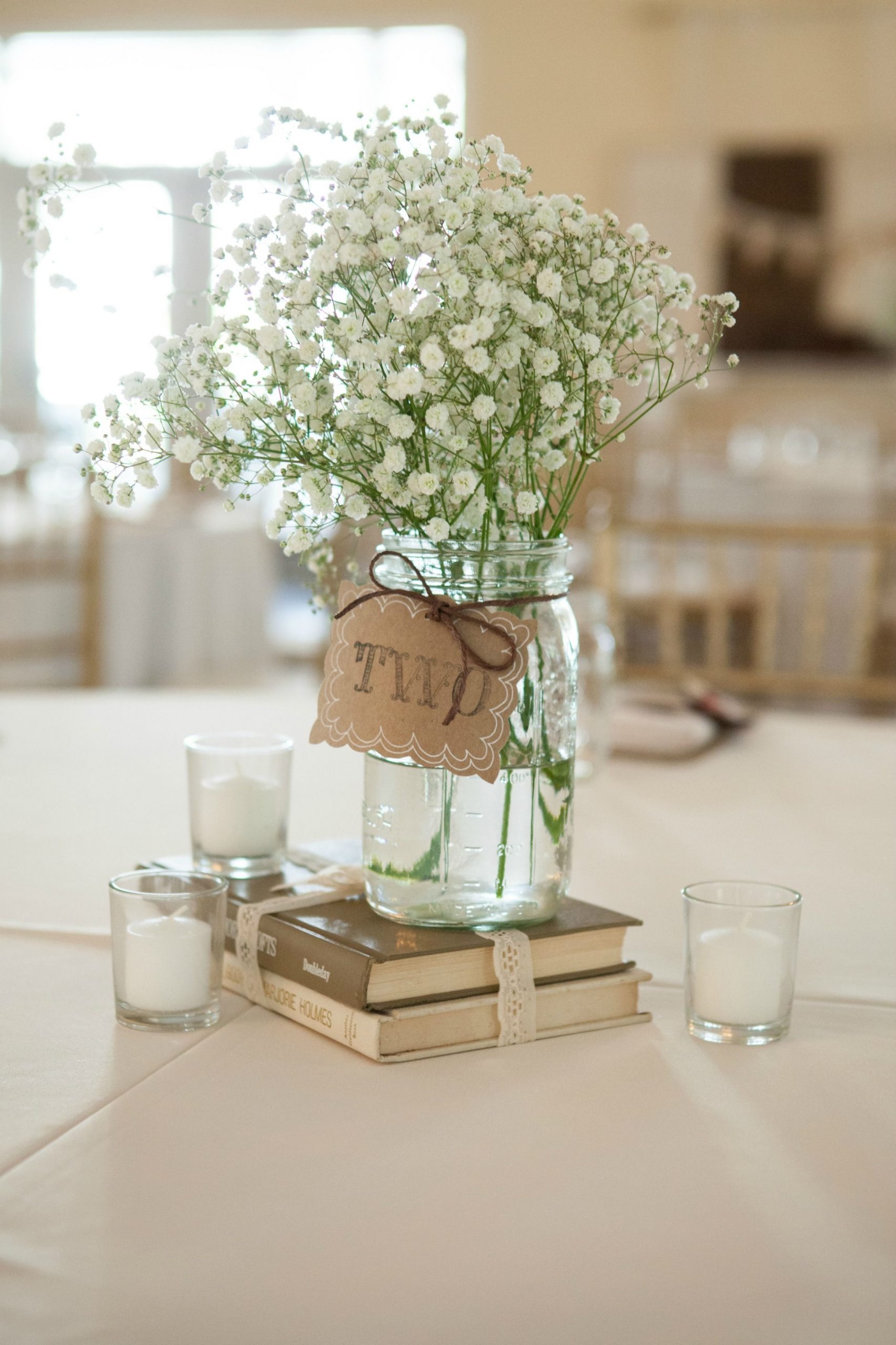 Simple Rustic Centerpiece Using Old Books Mason Jar Vases in proportions 2212 X 3319