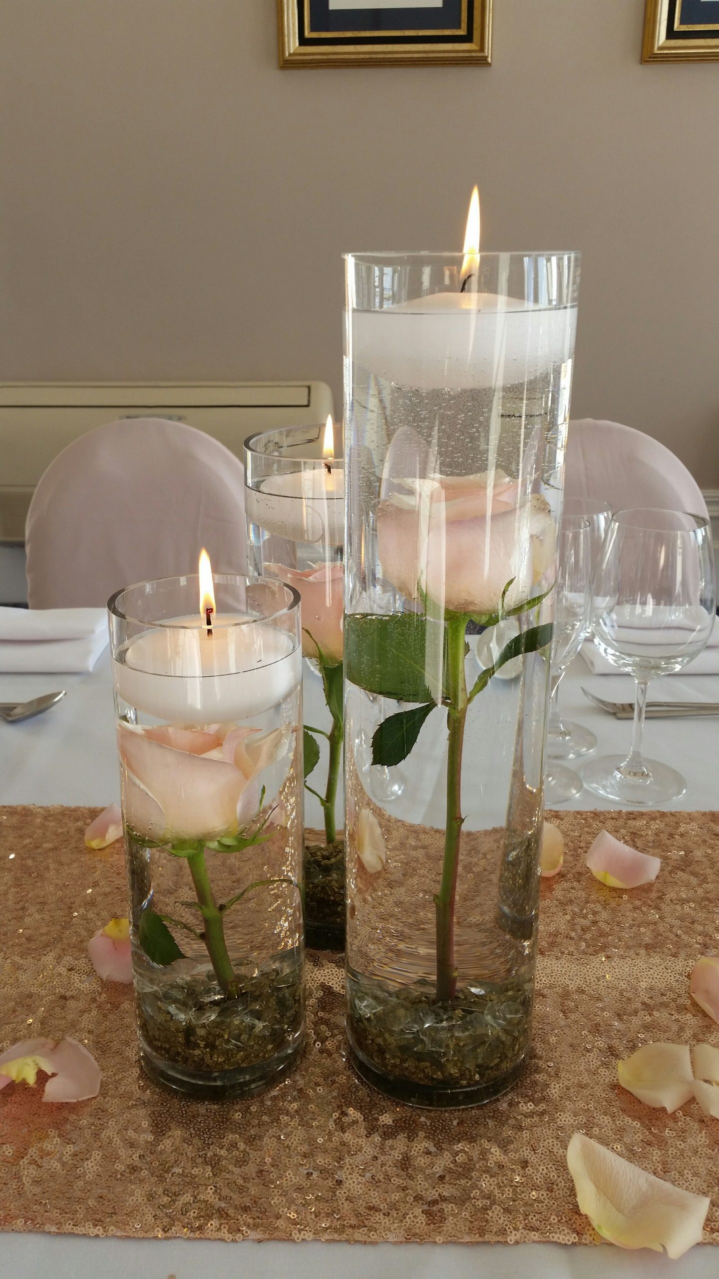 Submerged Flowers In Cylinder Vases Floating Candles throughout size 2241 X 3984