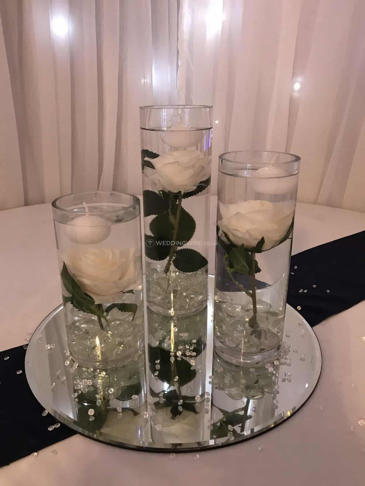 Trio Cylinder Rose Centerpiece From Busy Bee Events Photo 13 within size 1200 X 1600