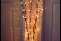 Twig Lights In Tall Vases Filled With Orchids And Peacock pertaining to size 776 X 1020