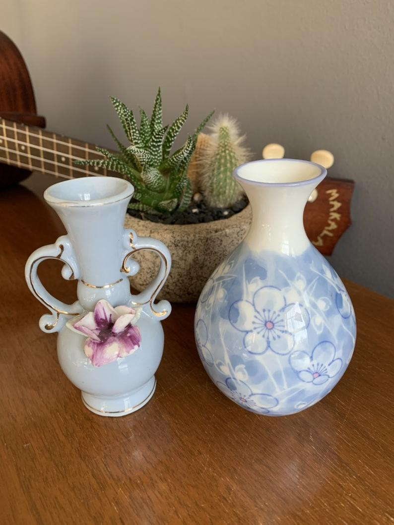 Two Small Vintage Blue And White Bud Vases One With A Ceramic Flower Decoration The Other With A Floral Pattern within size 794 X 1059